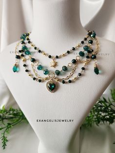 "Celestialcore Grunge Necklace is crafted with dark green glass pearls, acrylic crystal beads, zircon green heart pandent and gold plated  brass chains and accents . It is 14\" and has an extansion chain. If you want to change the length,I can customize this product for you.  Please do not wear the necklace while sleeping, showering or doing sports. I advise you to try to keep it away from water, chemicals and perfumes. If you have any request please do not hesitate to ask. Thanks for stop by For more visit my shop: ExangelsJewelry.etsy.com" Heart Beaded Jewelry, Dark Green Necklace, Jewelry Cottagecore, Gem Necklaces, Cottagecore Necklace, Fairycore Necklace, Grunge Necklace, Chain Necklace Diy, Ethereal Jewelry