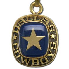 a gold and blue medal with a star on the bottom, in front of a white background