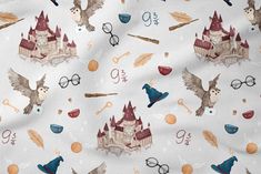 harry potter fabric with hogwart's castle and glasses on it