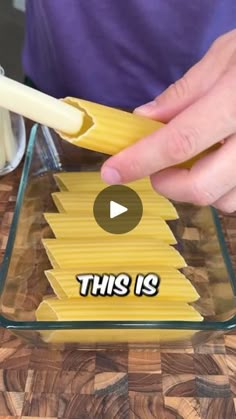 a video demonstrating how to make pasta noodles with the word this is spelled in italian