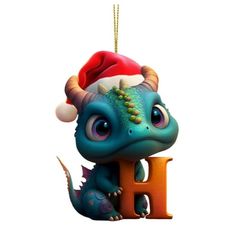 a christmas ornament with a blue dragon wearing a santa hat