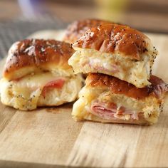 ham and cheese sandwich cut in half on a cutting board