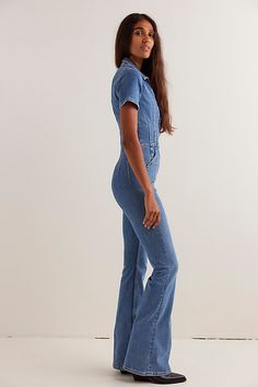 Our top-rated Jayde Flares — now in a stunning jumpsuit! The timeless flare silhouette you know & love in a curve-hugging instant outfit. **Fit:** Slim through the bodice and thigh with flared leg design **Features:** Exaggerated yoking and darting throughout, zip-up closure, collared neckline, vintage-inspired denim wash, stretch denim **Why We | We The Free Jayde Flare Jumpsuit at Free People in Light Wash, Size: M Free People Jumpsuit Outfit, Free People Jumpsuit, Flare Jumpsuit, Jumpsuit Outfit, Denim Wash, Stretch Denim, Boho Outfits, Bodice, Free People