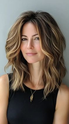 15 Hairstyles for Medium Length Hair: Stylish Ideas for Every Occasion Medium Wavy Bob, 15 Hairstyles, Layered Bob With Bangs, Wavy Lob, Curly Hair Types, Chin Length Bob, Low Maintenance Hair, Bob With Bangs, Wavy Bobs