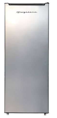 a silver refrigerator freezer sitting on top of a white wall