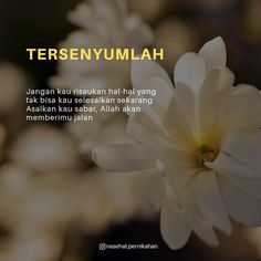 a white flower with the words tersenyimulah written below it