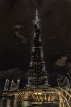 the tallest building in the world is lit up at night