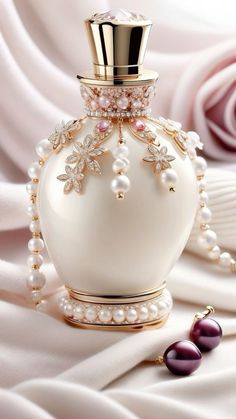 a white perfume bottle with pearls on it