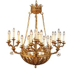 an antique chandelier with many candles on it