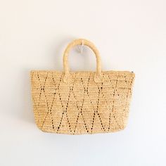 IN STOCK NOW SHIPPING FROM LOS ANGELES Introducing the Elena Handbags Hand Woven Fashion Raffia Top Handle Beach Bag! Perfect for any beach getaway, this bag combines fashion and function with its hand woven raffia material and convenient top handle. Carry all your essentials in style with this must-have accessory. Natural Soft Raffia Straw Handmade Lined Size: 10"H x 16"W x 6’‘D Designer Style ID: 8694 Beach Getaway, Woven Raffia, Straw Bags, Raffia Bag, Denim Bag, Knitted Bags, Designer Style, Canvas Bag, Beach Bag