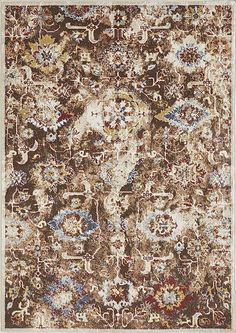 an area rug with many different colors and designs on the carpet, including brown, blue,