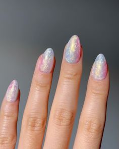 🫧Twilight Aura- These premium handmade press-on nails feature a mesmerizing blend of soft pastels with an iridescent finish, capturing the dreamy colors of twilight for an enchanting and ethereal look. 🛍️ nomoodnails.com #nomoodnails #pressonnails #pressons #almondnails #shortnails #fyp #handmadenails Pearlescent Nail Designs, Lover Inspired Nails, Iridescent Nail Designs, Pearlescent Nails, Ethereal Nails, Iridescent Nails, Dreamy Colors, Opal Nails, Aurora Nails