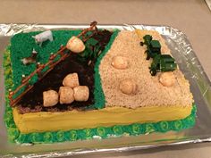 a cake that is made to look like a farm scene