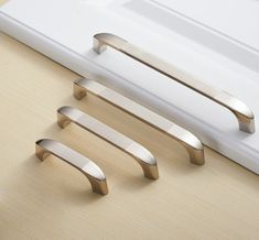 an image of some metal handles on a table