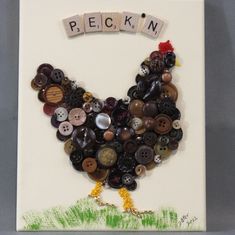 a chicken made out of buttons with the word pick'n spelled on it, sitting in front of a gray background