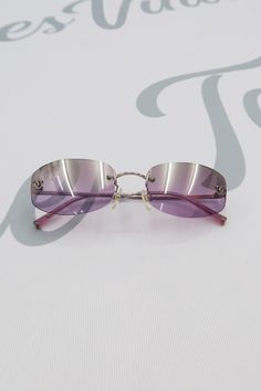 Chanel Purple Tinted Sunglasses Vintage Glasses Iconic Sunglasses, Formal Purple Sunglasses With Tinted Lenses, Formal Purple Tinted Sunglasses, Vintage Chanel Sunglasses Aesthetic, Vintage Chanel Sunglasses, Luxury Vintage Silver Sunglasses, Vintage Chanel Clothing, Classic Purple Tinted Sunglasses, Vintage Pink Glass Sunglasses