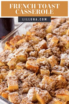 french toast casserole in a glass dish with powdered sugar on top and the title above it