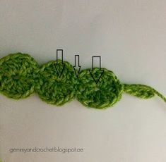 the crochet is being used to make an interesting pattern for a scarf or shawl