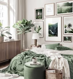 a bedroom with green bedding and pictures on the wall above it's bed