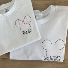 This short sleeve white tee is made of 100% organic cotton (I use Honest baby clothing brand) and comes embroidered with your little one's name. Choose either a mickey or Minnie outline. This design is also available on a infant size bodysuit. Please wash on delicate cycle in cold water, and dry normally. If you are wanting a different design, more wording, or a different clothing style, please send me a message so we can discuss the details. If you need this order rushed, please add these to yo Customizable Cute White T-shirt, White Basic T-shirt With Custom Embroidery, Cute White T-shirt With Custom Embroidery, White Cute T-shirt With Custom Embroidery, Minnie Outline, Diy Disney Ears, Honest Baby Products, Baby Mickey Mouse, Disney Embroidery