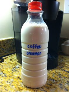 a bottle of coffee creamer sitting on top of a counter