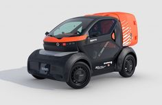 an orange and black vehicle on a gray background