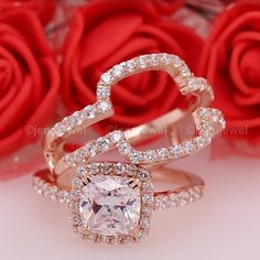 two rose gold wedding rings with a cushion cut diamond surrounded by round brilliant czrs