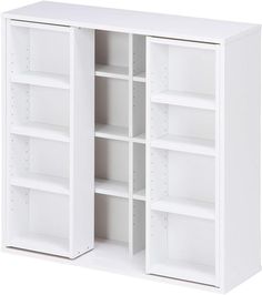 an open white bookcase with shelves on each side and two doors at the bottom