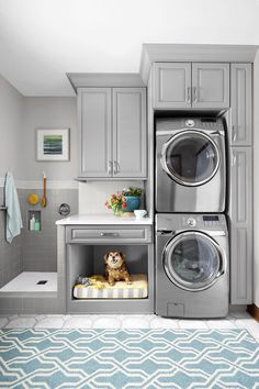 an appliance is shown in the kitchen with grey cabinets and white counter tops