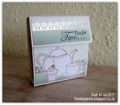 a card with a teapot and cup on it, which reads tea for two