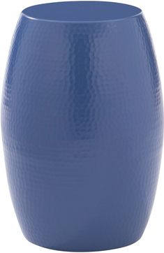 a large blue vase sitting on top of a table