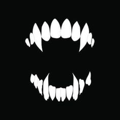 an image of the mouth and teeth of a monster's smile on a black background