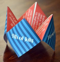 an origami boat with the word 4th of july written on it