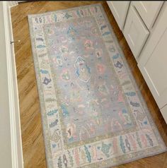 a rug on the floor in a kitchen