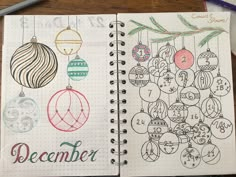 a notebook with christmas ornaments on it and the words december written in cursive writing