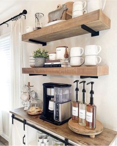 some shelves that have coffee cups and other items on them