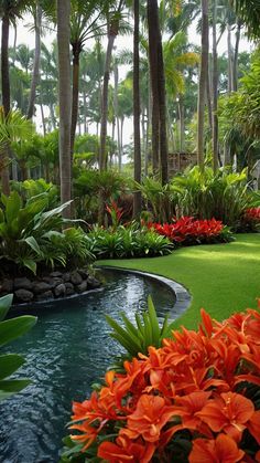 an exotic garden with lush green grass and orange flowers in the foreground, surrounded by palm trees