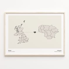 a framed map of the united states with a heart on it's location in black and white