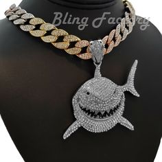 Hip Hop 6ix9ine Shark pendant & 18" Iced Multi Color Cuban Choker Chain Necklace HIP HOP CELEBRITY STYLE BRAND NEW USA SELLER Product Description Hip Hop Iced Cuban Choker Chain  : Hip Hop Celebrity Style Chain 12mm 18" Iced Cuban Chain Lab Diamonds on Chain & Pendant Gold & Silver & Rose gold plated Pendant : Hip Hop Celebrity Style Pendant & Chain White GOLD PLATED SIZE OF PENDANT:  70mm x 60mm High Quality and polished. Payments: US Customers: Paypal accepted International Customers: Paypal accepted Shipping: For Shipping & Handling within the US: FREE We do combine shipping! We ship via USPS (Post office) First Class Mail Tracking Info will automatically be posted via Paypal and ebay. Approximate Delivery Times: US: 2-5 BUSINESS DAYS Canada: 1-2 weeks Europe: 1-6 weeks South America: 2 Cuban Choker, Choker Chain Necklace, Shark Pendant, Hip Hop Necklace, Choker Chain, Gold Chain With Pendant, Chain Choker Necklace, Cuban Chain, Pendant Gold