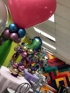 some balloons and other decorations in a room