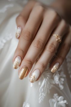 Shine on your big day with 51 Gold Wedding Nails. These dazzling designs are perfect for brides who love bling, ranging from subtle shimmer to full-on glitter. Wedding Nails Design Gold, Gold And White Bridal Nails, Wedding Nails Indian, Oval Gold Nails, Bridal Nails Gold, White Glitter Nail Designs, Rustic Wedding Nails For Bride, Nail Art Photoshoot, Wedding Nails With Gold