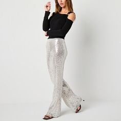 This pair of women's sequinned palazzo pants by Bold Elements will add sparkling flair to your evening wardrobe. Cut for a high-rise, this pull-on pair have a comfortable elastic waistband and a flare-leg silhouette. Wear it with a camisole or blouse and heels. Front Style: Flat FrontFeatures: SequinsClosure Type: Full ElasticFit: Regular FitRise: High RiseFiber Content: 95% Polyester, 5% SpandexFabric Description: Mesh NetLining: Fully LinedLining Material: PolyesterInseam: 32 InLeg Style: Fla… Sequence Pants, Flare Palazzo Pants, Large Pants, Palazzo Pant, Color Champagne, Palazzo Pants, High Rise, Wardrobe, Pants