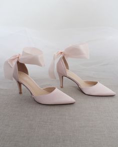 An all-time classic and simplicity of satin pointy toe heels with satin ribbon ankle tie. Simple yet elegant are great combination and will definitely be a favorite. DETAILS: HEELS: 3 inches COLORS AVAILABLE: Black, Burgundy, Champagne, Dusty Pink, Light Blue, Ivory, and White UPPER: Synthetic upper and lining MATERIALS: Mandmade outsole ORIGIN: Imported Blush Pink Wedding Heels, Light Pink Shoes Heels, Dusty Pink Heels, Light Pink Wedding Shoes, Light Pink Kitten Heels, Pink Quinceanera Heels, Pink Shoes Wedding, Pink And White Heels, Soft Pink Heels