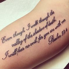 a tattoo with the bible verse written on it