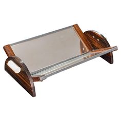 a wooden and glass serving tray with handles