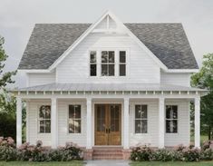 a white two story house with porches and columns on the front door is shown