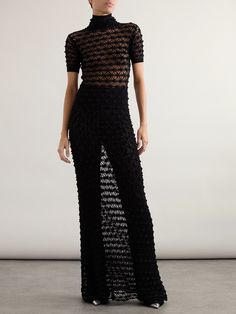 Alaïa’s maxi dress is knitted from soft, stretchy yarns to create an open, lace-like finish. It's designed for a figure-skimming fit and has a high neckline and floor-pooling hem. Wear yours with tonal briefs or tights for coverage. Lilith Aquarius, Aquarius Fashion, Turtleneck Maxi Dress, Winter Work Wear, Ribbed Maxi Dress, Dress Open Back, Knitted Dress, Fashion Weeks, Shearling Jacket