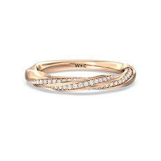 a rose gold wedding band with white diamonds