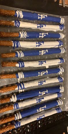 the baseball bats are lined up and ready to be used in the dugout or on the field