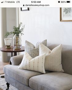 a living room filled with furniture and decor